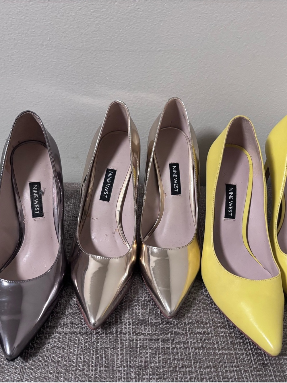 Nine West Metallic Gold Pointed-Toe Pumps (pair shown with silver and yellow)